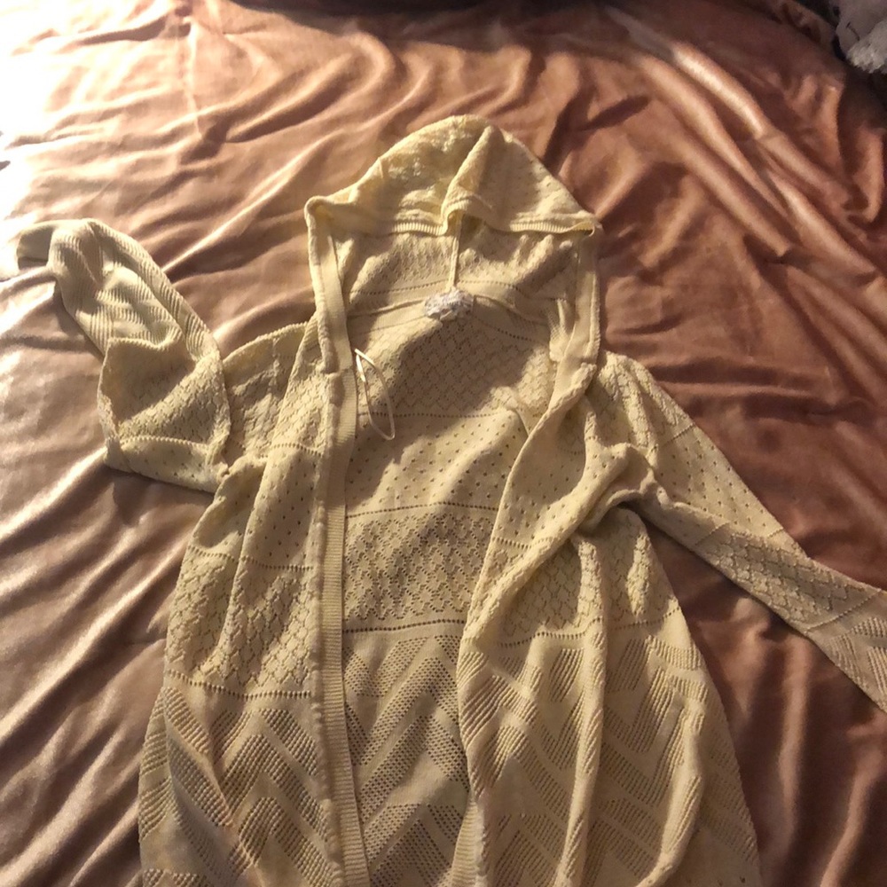 beige cardigan.